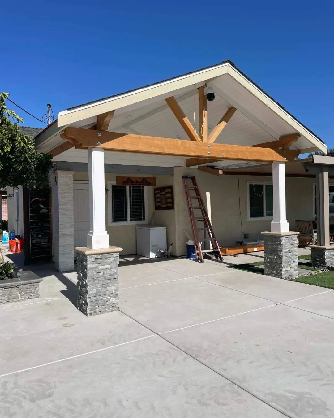 Backyard upgrade with an elegant dining area and overhead lighting