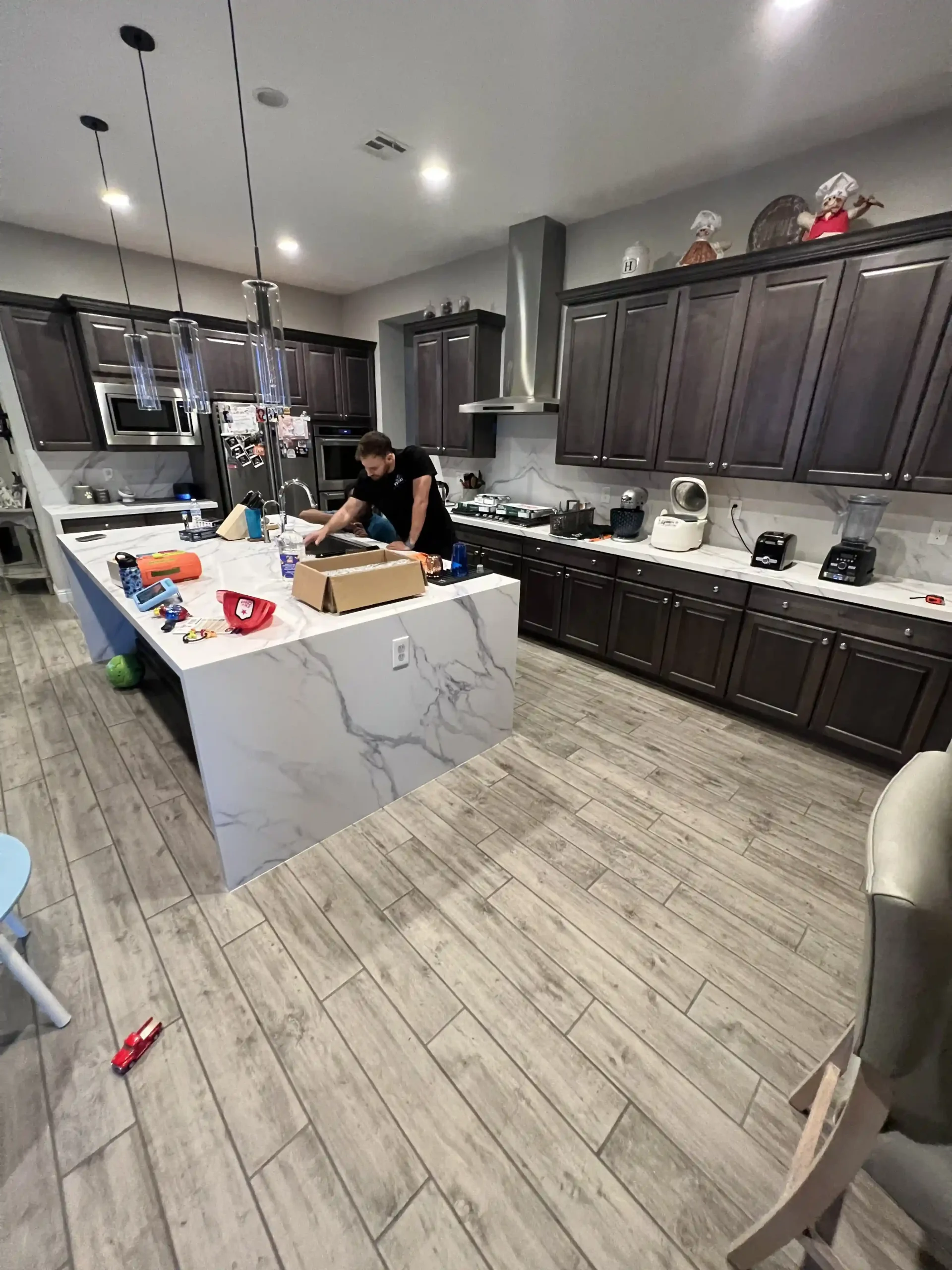 Final kitchen remodel showing large island and surrounding cabinetry by Pro Vegas Home Remodel