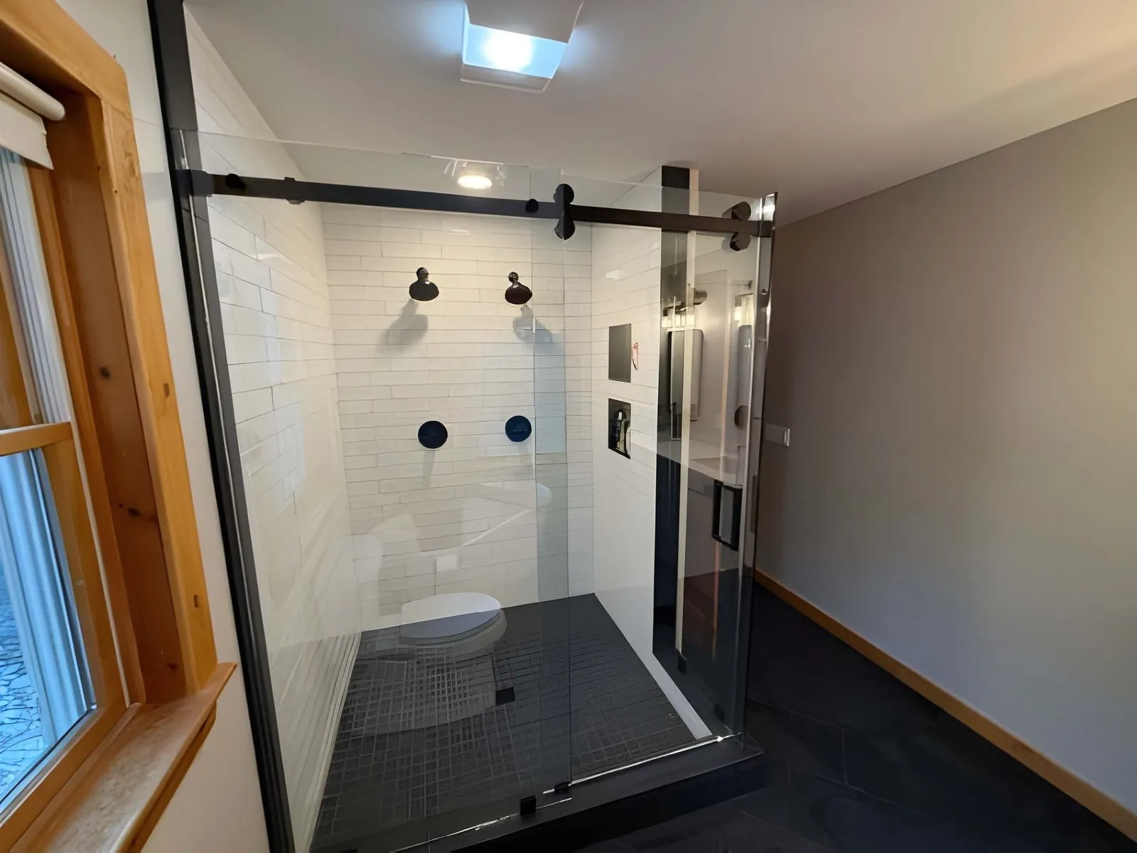 Completed shower remodeling after bathtub-to-shower conversion upgrade