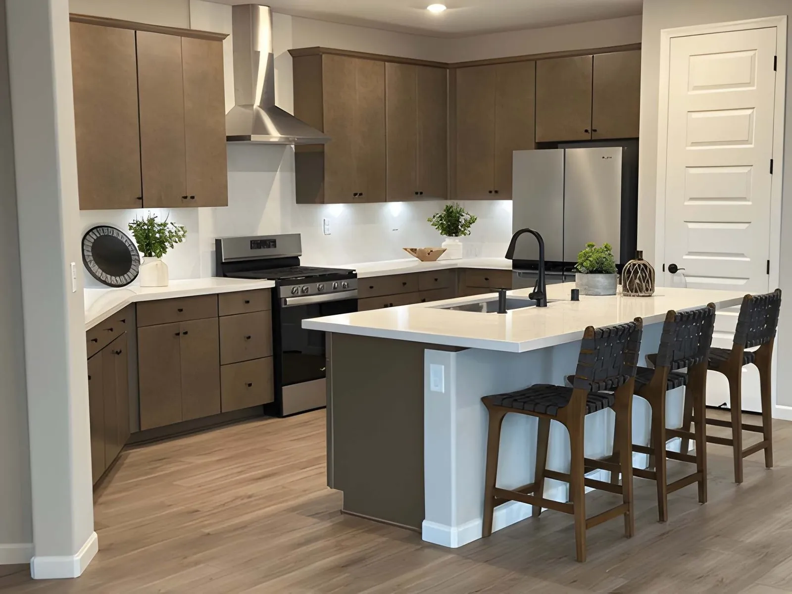 Kitchen and Bathroom Remodeling in Winchester modern kitchen renovation with quartz countertops, open layout, and upgraded lighting in Winchester home