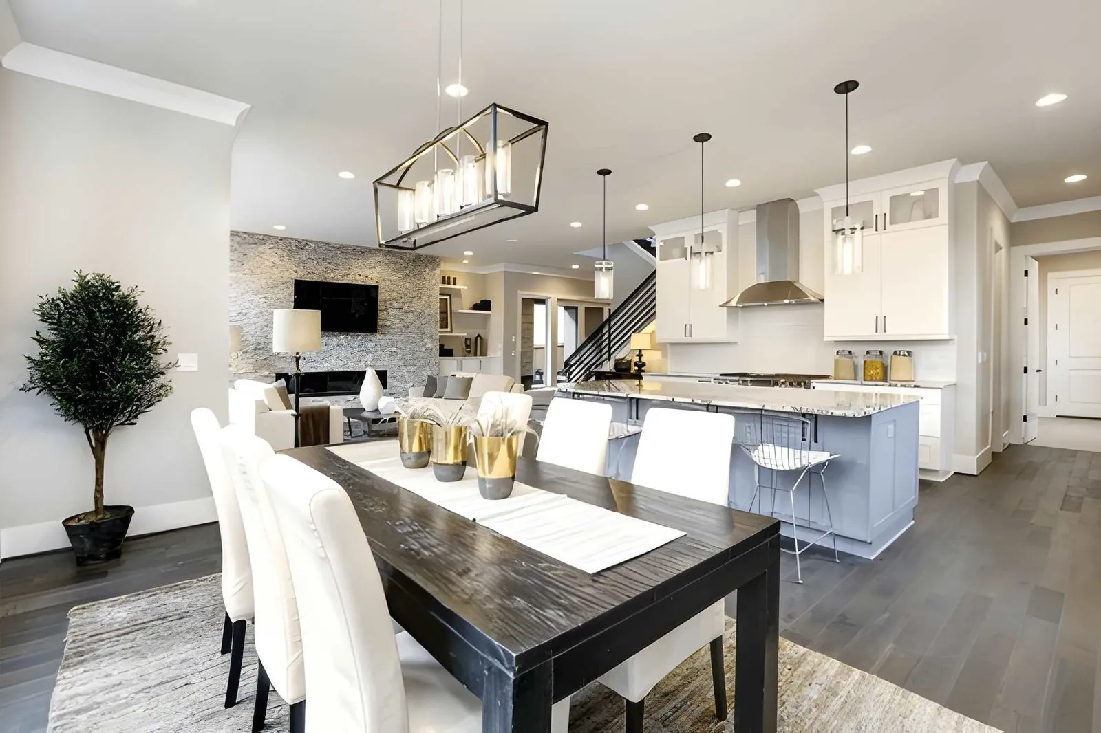 Kitchen and Bathroom Remodeling in Whitney showcasing an open-concept kitchen layout with island seating and contemporary finishes in a remodeled home