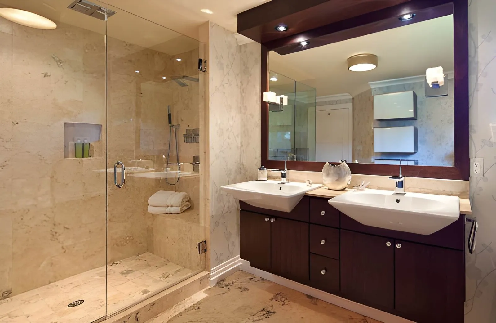 Kitchen and Bathroom Remodeling in Paradise displaying a contemporary bathroom renovation with floating vanity, LED lighting, and sleek finishes