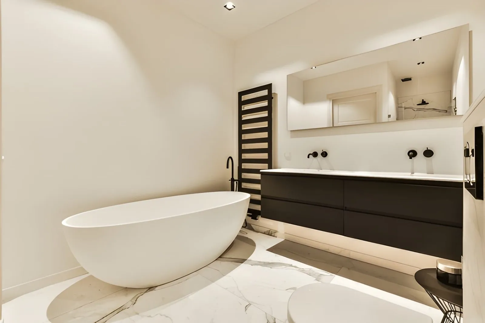 Kitchen and Bathroom Remodeling in Winchester small bathroom renovation with space-saving vanity, modern lighting, and updated fittings in Winchester